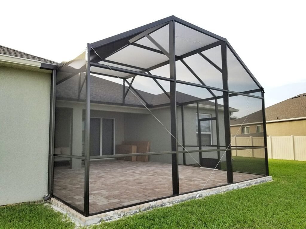 Aluminum lanai screen enclosure installed in Spring Hill, FL on backyard area