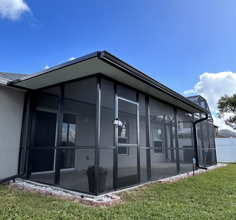 Lanai screen enclosure in Spring Hill, FL attached to residential patio and backyard