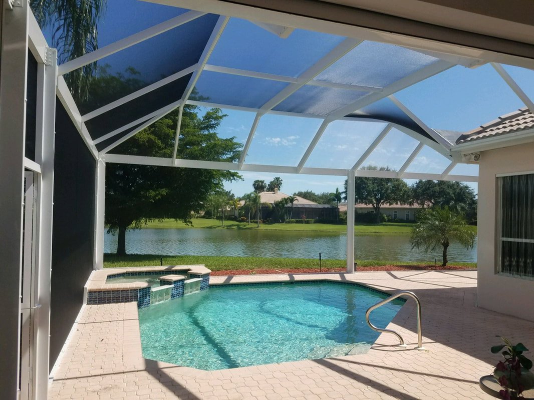 Pool enclosure rescreening in Spring Hill, FL covering backyard pool and patio area